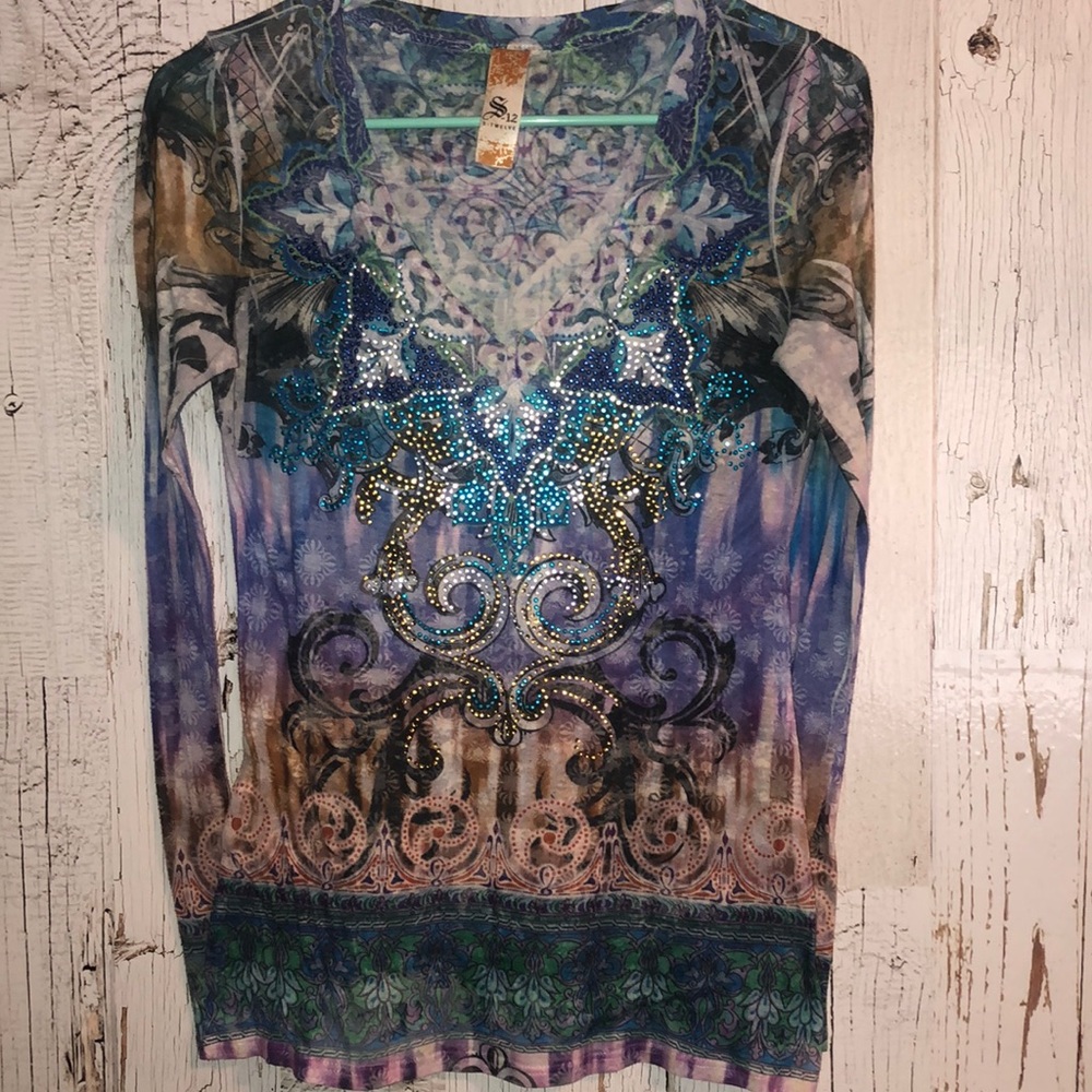 Rhinestone purple, brown, and blue blouse.